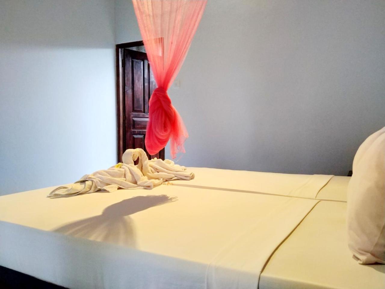 Angga Guest House เปมูเตรัน ภายนอก รูปภาพ